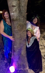 Three Goddess behind tree